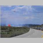 slurry bomber makes a run on sage brush fire, US highway 395 north of BishopCA